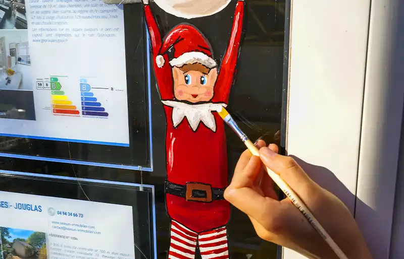 Peinture sur vitrine Noël à main levée artiste peintre Hyères